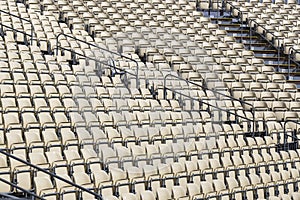 Rows of plastic chairs for spectators