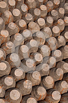 Rows of pots, bottoms up, background. Ceramic Pottery in Potter