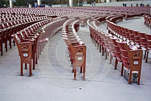 Rows of red chairs in the auditorium photo