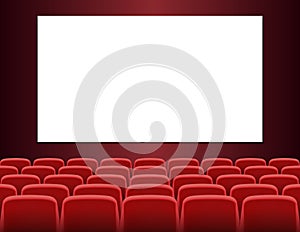 Rows of red cinema or theater seats with blank screen