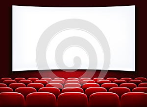Rows of red cinema or theater seats photo