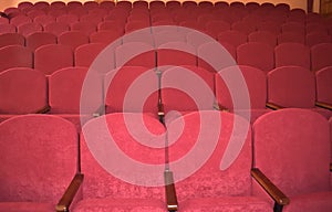 Rows of red seats in the cinema