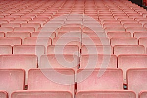 Rows of red stadium seats