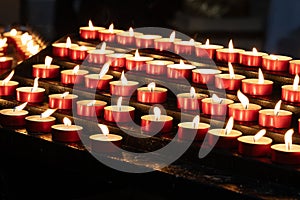 Rows of Red Tealight Candles Burning