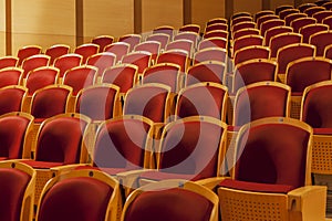 Rows of red theater seats