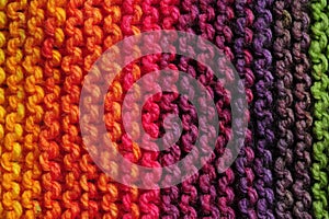 Rows of seamless knitted patterns in vivid rainbow mix of colors