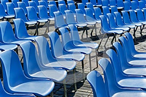 rows of seats in stadium vacant