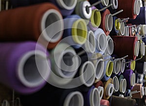 Rows of sewing threads of various colors