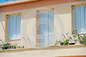 Rows of shutters on facade of typical old european