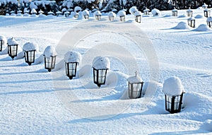 Rows of small lanterns on graveyard