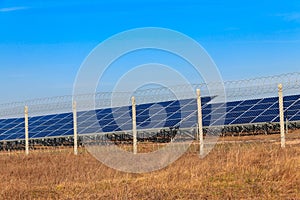 Rows of solar panels in solar power plant. Photovoltaic modules for innovation alternative energy