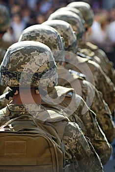 Rows of soldiers in helmets