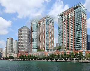 Rows of tall condos lining Chicago`s Riverfront.