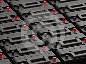 Rows of 12V car batteries