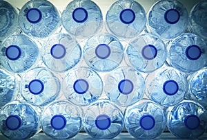 Rows of water in plastic bottles