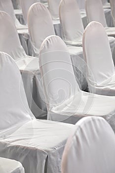 Rows of white chairs