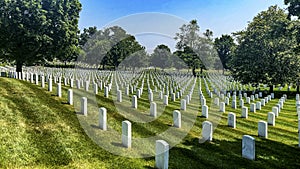 Rows of white marble tombstones at Arlington National Cemetery, the world\'s most famous military cemetery.