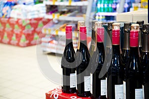 Rows of wine bottles. Wine bottles in the store. Copy space photo