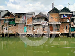 Roxy mas, Jakarta, IndoSlum house located in a densely populated area on the river side
