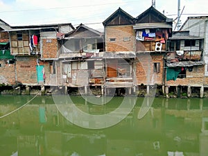 Roxy mas, Jakarta, IndoSlum house located in a densely populated area on the river side