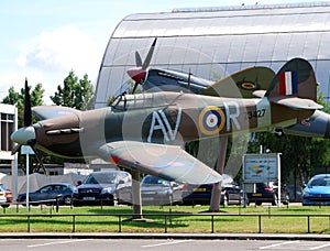 A Spitfire and a Hurricane on display at the main entrance of the museum.