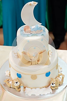 Royal baptize cake with candle