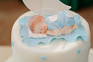 Royal baptize cake with candle photo