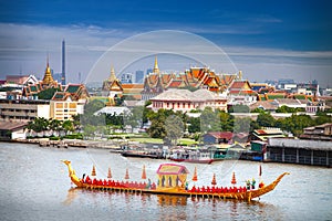 Royal Boat and river with grand palace background in Bangkok city
