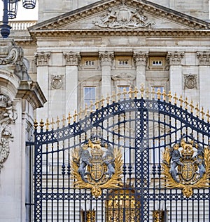 Royal Coat of Arms symbols at the gate of Buckingham palace