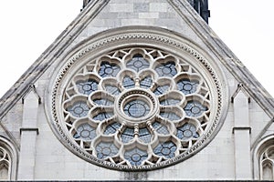Royal Courts of Justice, gothic style building, rose window on facade, London, United Kingdom