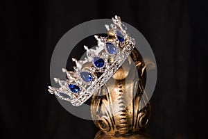 Royal crown with sapphires, luxury retro style.