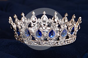 Royal crown with sapphires, luxury retro style.