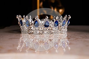 Royal crown with sapphires, luxury retro style.