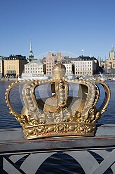 Royal Crown on Skeppsholm Bridge with Old Town behind; Stockholm