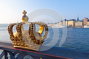 Royal crown and Stockholm cityscape