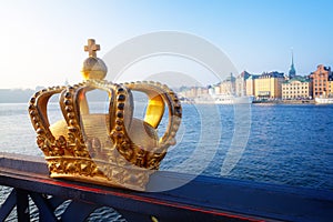 Royal crown and Stockholm cityscape