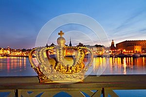 Royal crown and Stockholm cityscape