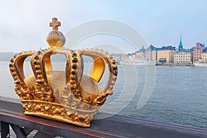 Royal crown and Stockholm cityscape
