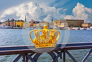 Royal crown and Stockholm old town Gamla Stan cityscape, Sweden