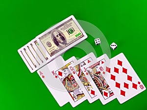 Royal flesh- playing cards on green broadcloth.