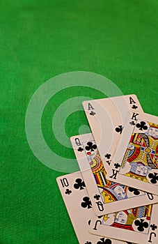 Royal flush poker cards combination on blurred background casino game fortune luck