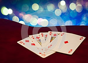 Royal flush poker cards combination on blurred background casino game fortune luck