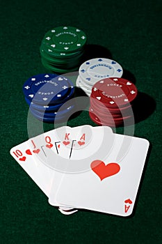 Royal flush of spades and chips