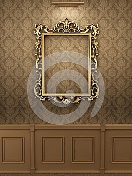 Royal golden frame on the wall in interior.