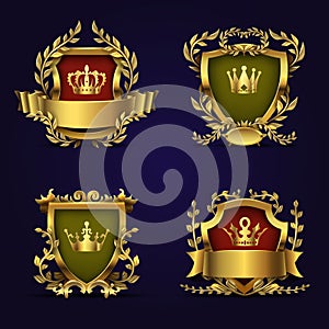Royal heraldic vector emblems in victorian style with golden crown, shield and laurel wreath