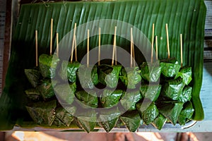 A Royal Leaf wrap Appetizer Miang Kham in the stick