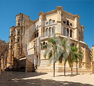 the Royal Monastery of San JerÃÂ³nimo from Calle CompÃÂ¡s de San JerÃÂ³nimo on a sunny day with clear skies in Malaga, Spain