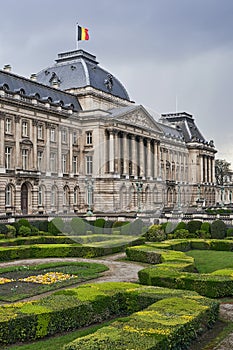 The Royal Palace in Brussels, Belgium from the northeastern corner in spring. National flag of the Kingdom of Belgium