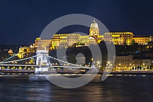 Royal palace and Chain bridge over Danube river at night, Budapest, Hungary