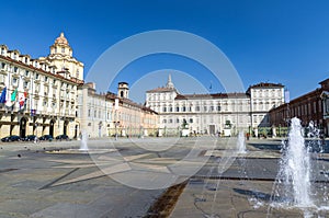 Royal Palace Palazzo Reale and San Lorenzo church building, Torino city with clear blue sky, Piedmont, Italy photo